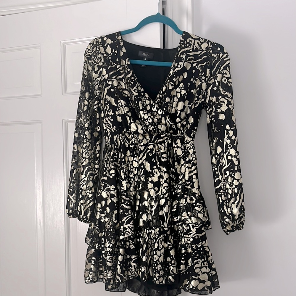 Dress purchased from bloomingdale’s by the brand Aqua. It was worn only once.